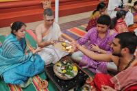 Shri Guru Paduka Pujana and Teertha Vitarana; Picture Courtesy Shri Chandrashekhar Padubidri