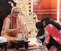 Tirtha Vitarana and Shri Guru Paduka Pujana; Picture courtesy Shri Ganesh Damble
