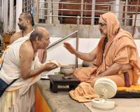 Tirtha Vitarana; Picture Courtesy Shri Jaikishan Kandlur